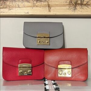 Furla Women's Clutch Trio - Red, Orange, Gray ($99 each)
Bundle of 3 $250